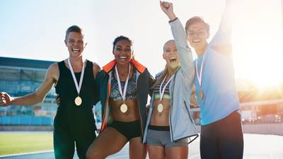 Cheering athletes with medals