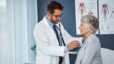 Physician examining patient