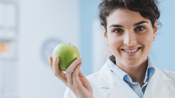 Dietitian holding apple