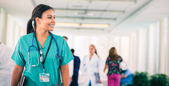 nurse walking down hallway