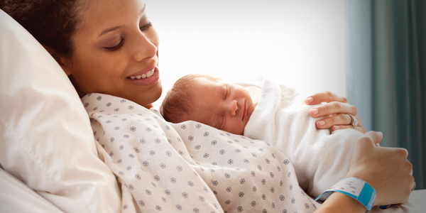 Mother with sleeping baby